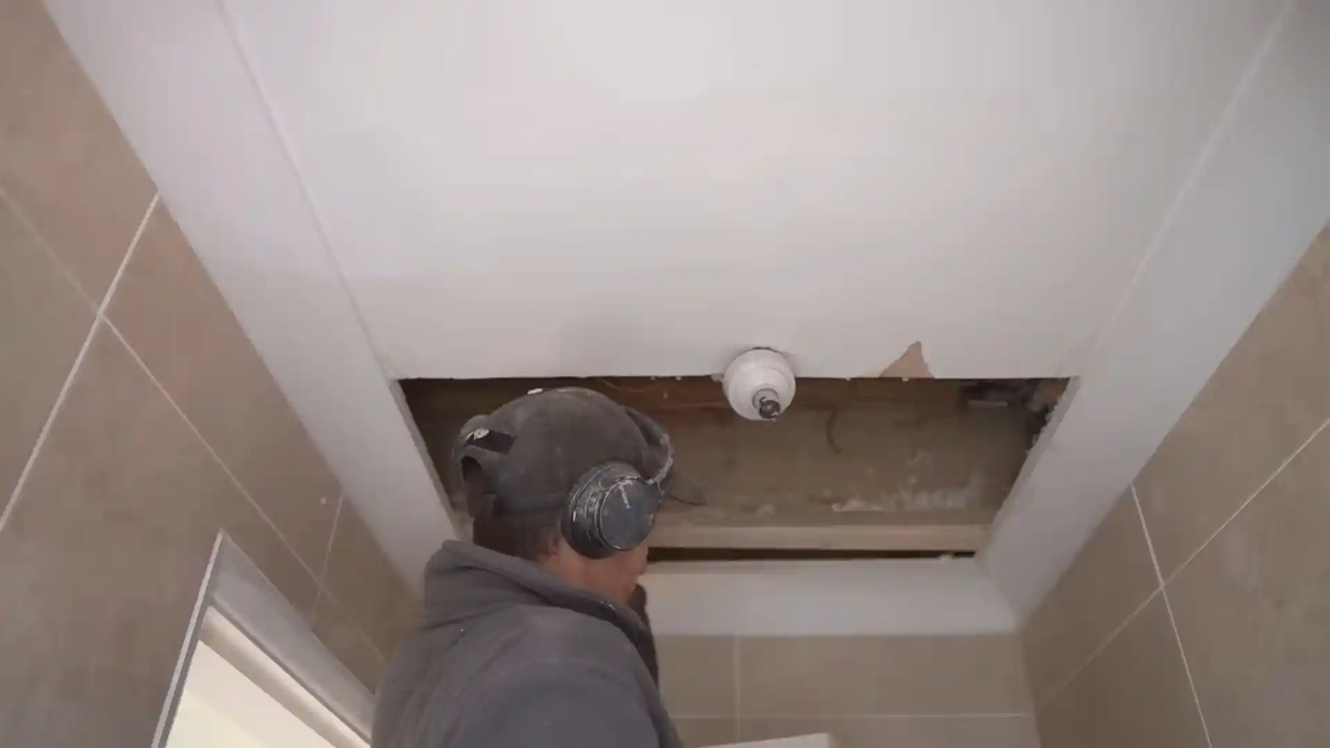 Water-damaged ceiling with staining and sagging drywall in Montgomery Village, MD